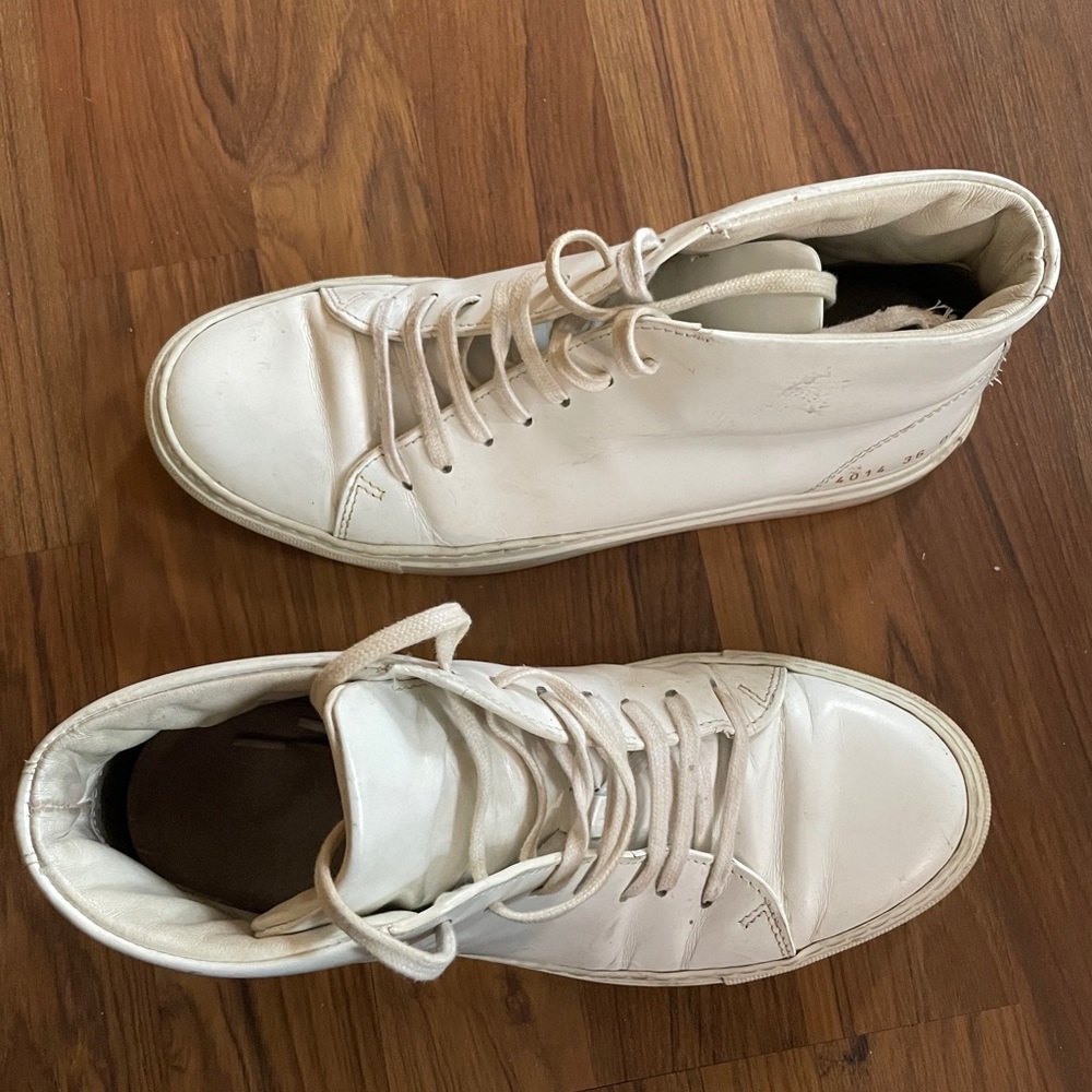 White high top leather common project sneakers
